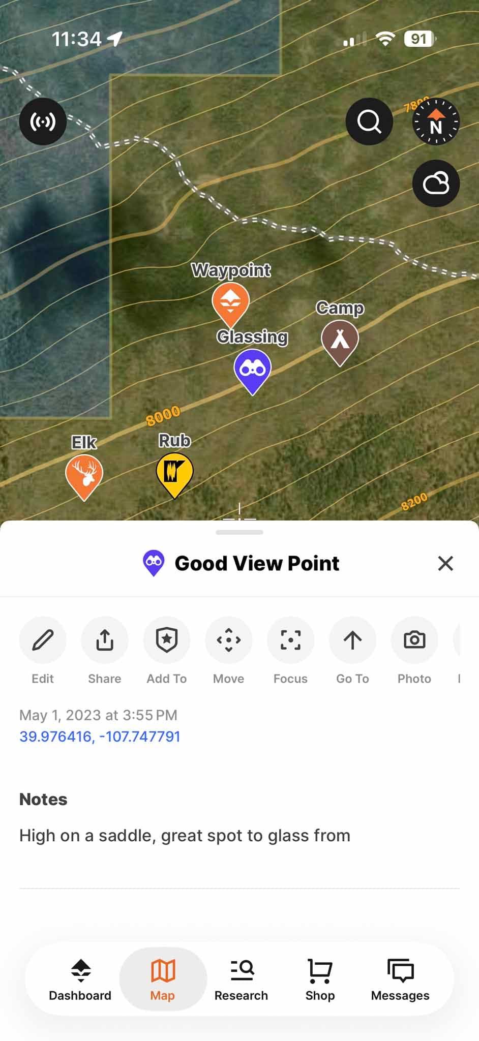 A saved waypoint in the GOHUNT app with its coordinates, notes, and options to add a photo or navigate to it