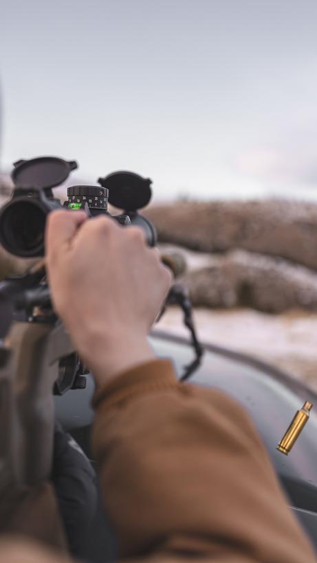 Checking equipment before shooting rifle 2