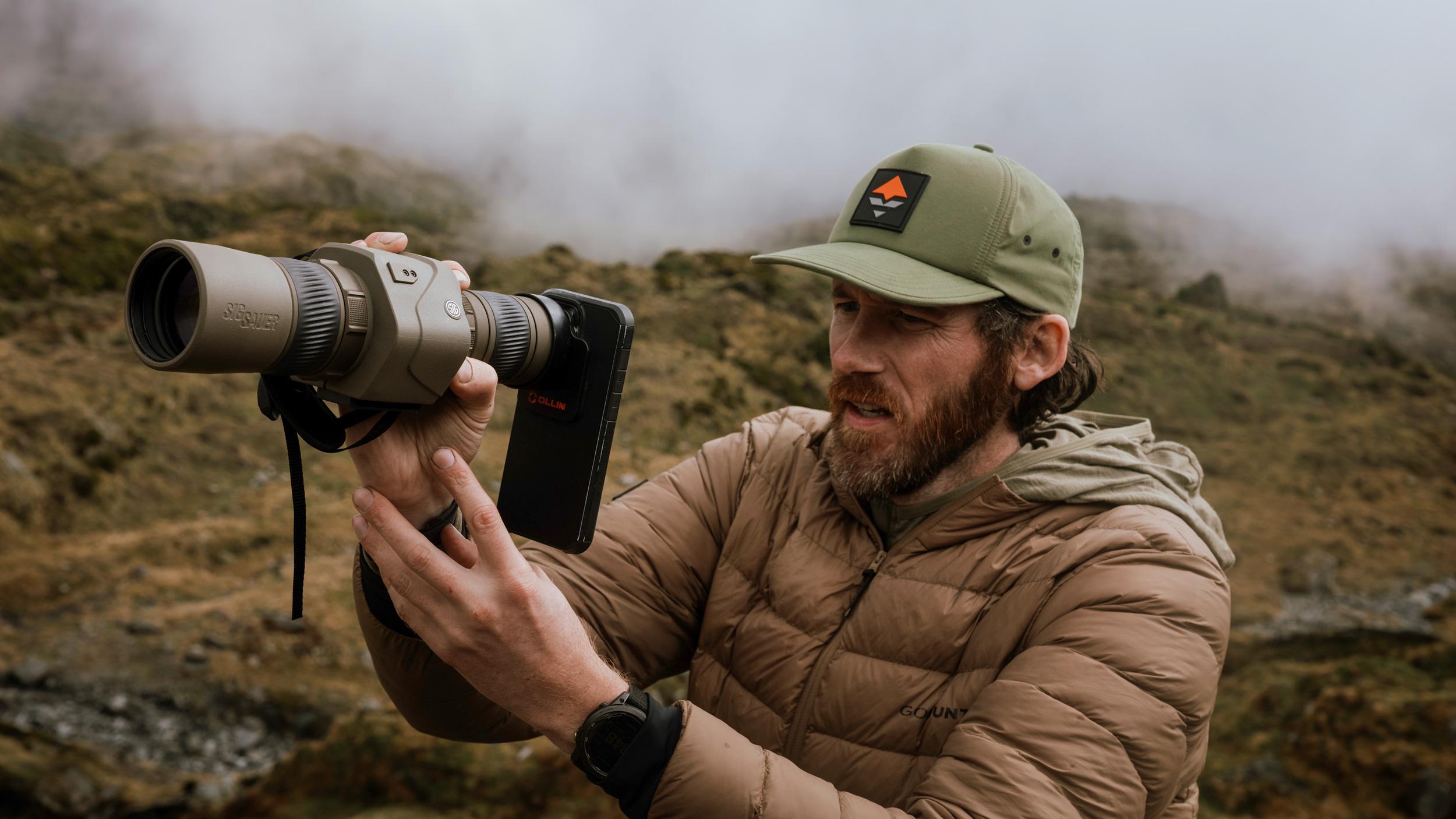 Brady Miller digiscoping handheld with SIG SAUER OSCAR6 HDX Pro image stabilized spotting scope
