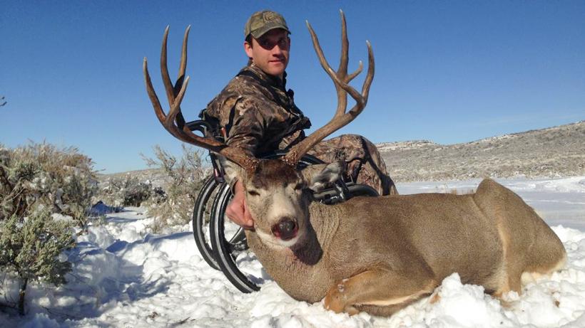 Kevin with an idaho mule deer taken with deadline outfitters