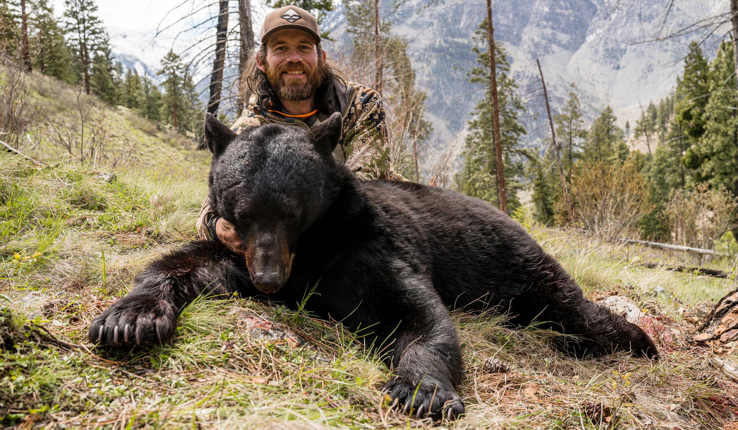 Brady Miller with black bear