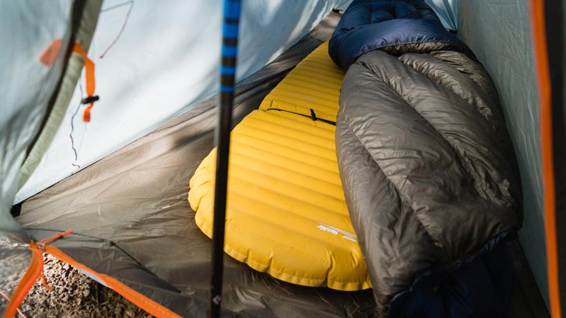 Quilt sleeping system in tent