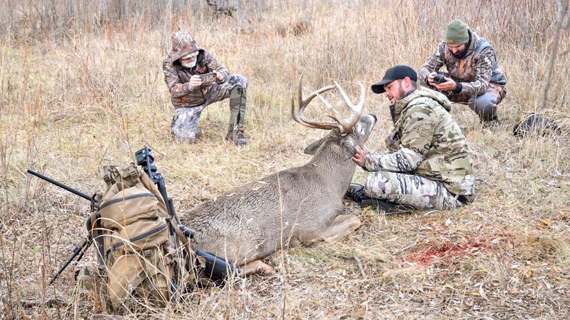 Taking harvest photos of stephen spurlock 2015 whitetail