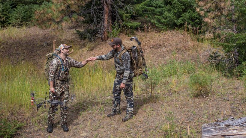 Celebrating an elk hunt with a friend