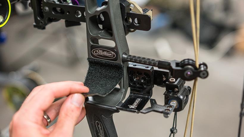 Applying velcro tape to mathews bow riser