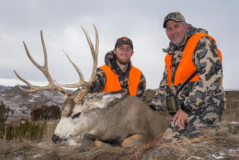 Bryce and dad with the buck