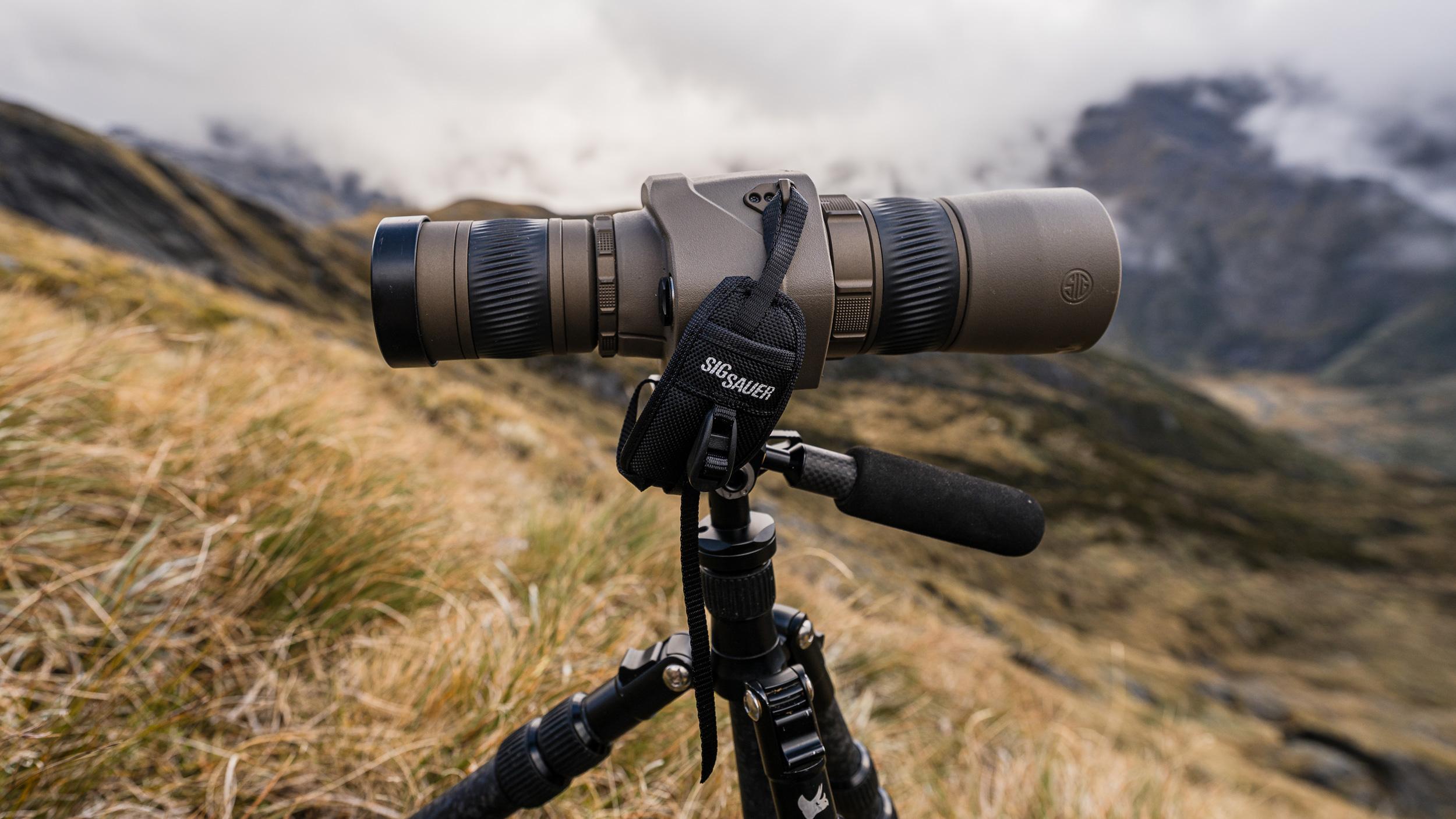 Hand strap on SIG SAUER OSCAR6 image stabilized spotting scope for handheld glassing