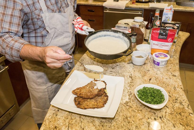 16 adding gravy to fried elk meat