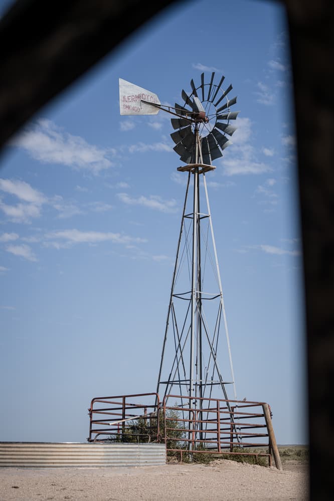 Windmill and stock tank for bowhunting antelope