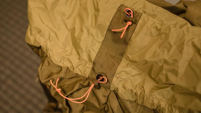 Drawcord on mystery ranch marshall backpack