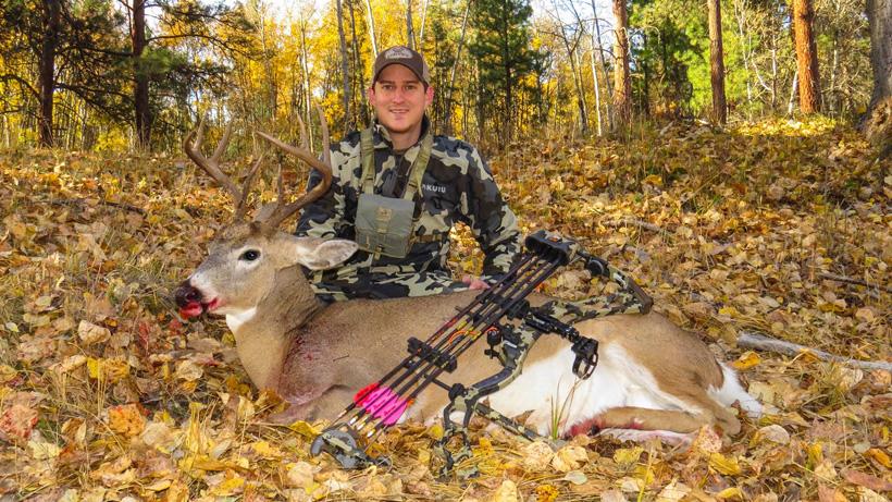 Dave barnett with his montana archery buck