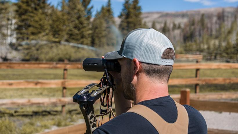 Glassing with binoculars on bow