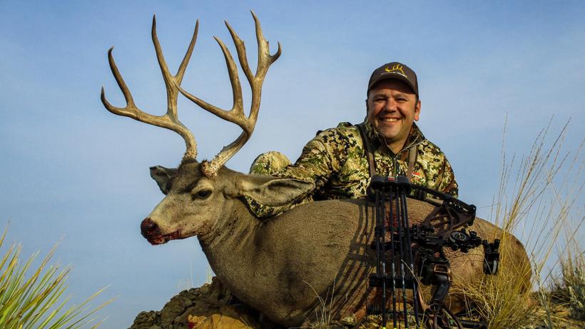 US veteran with a harvested wyoming mule deer
