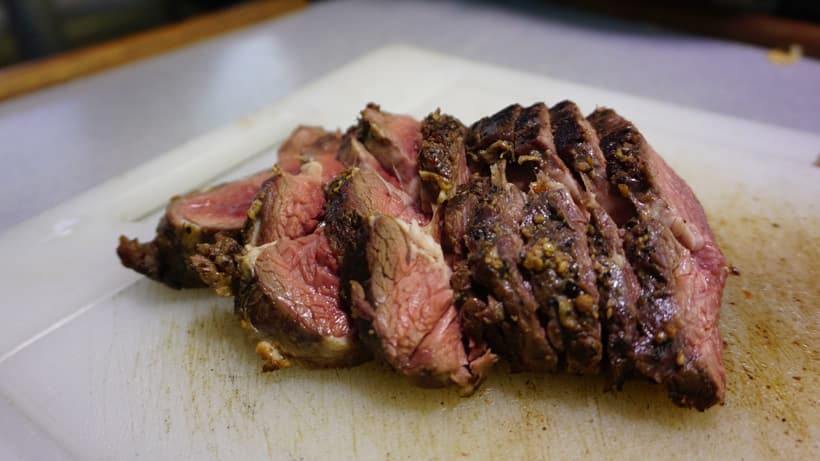 Cooking sitka blacktail backstraps on boat