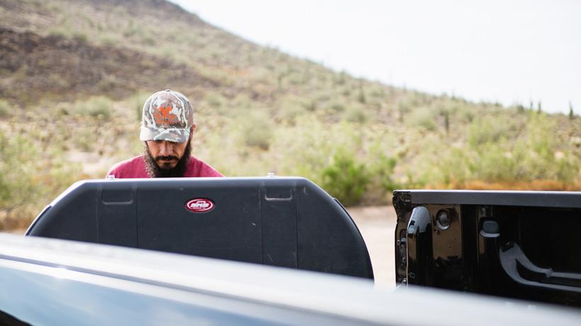 Josh kirchner preparing for archery practice