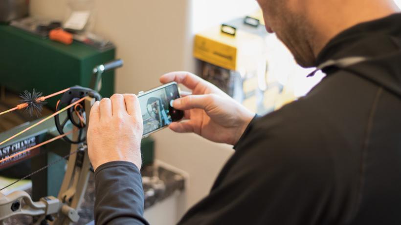 Taking photos of the bow string change process