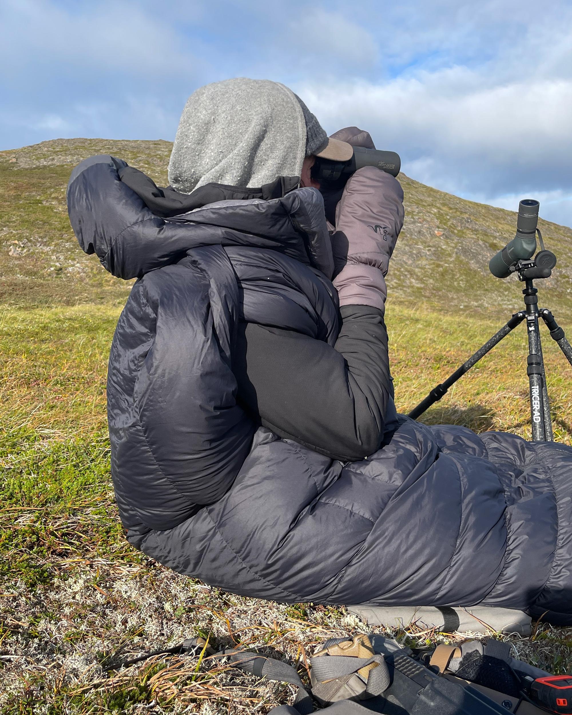 Ryan Lampers glassing in Peax SOLACE 15 degree sleeping bag while hunting