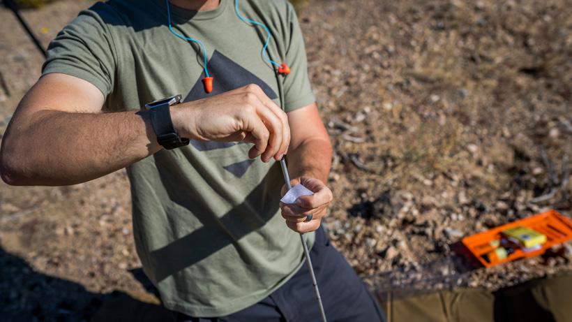 Preparing to clean rifle barrel