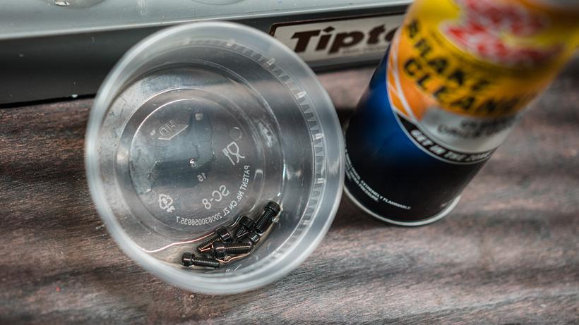 Cleaning riflescope ring screws with brake cleaner