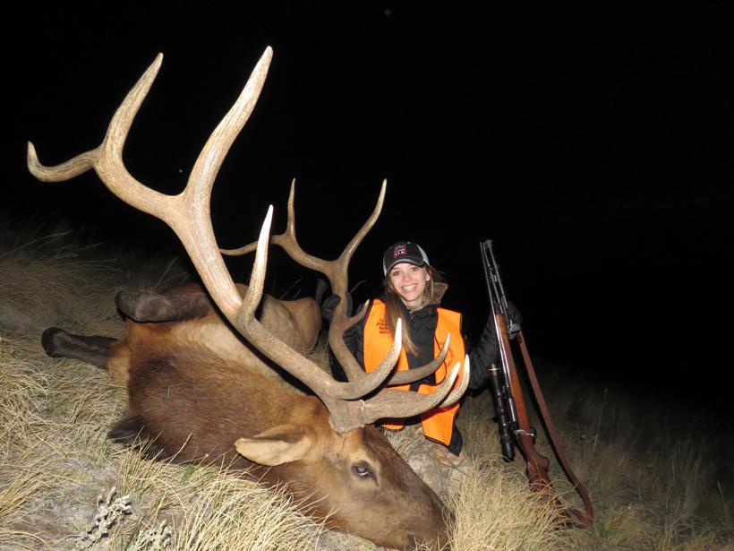 Maddy with a great montana bull elk taken with northern rockies outfitters