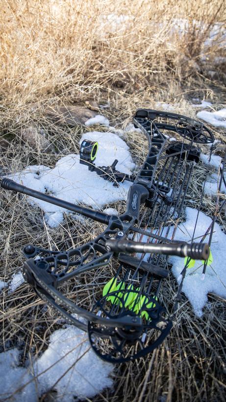 Checking equipment before shooting mathews bow