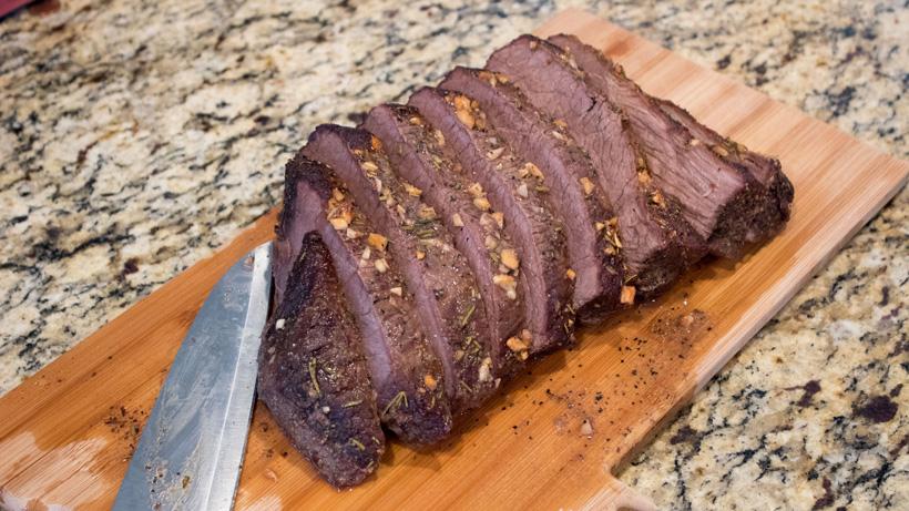 Cutting half inch elk roast slices