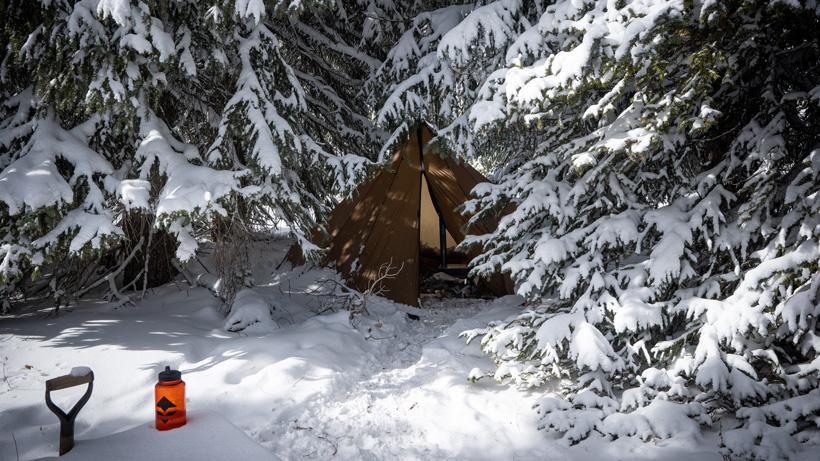 Snowy seek outside tipi