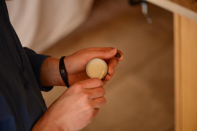 Applying string wax to bolt threads