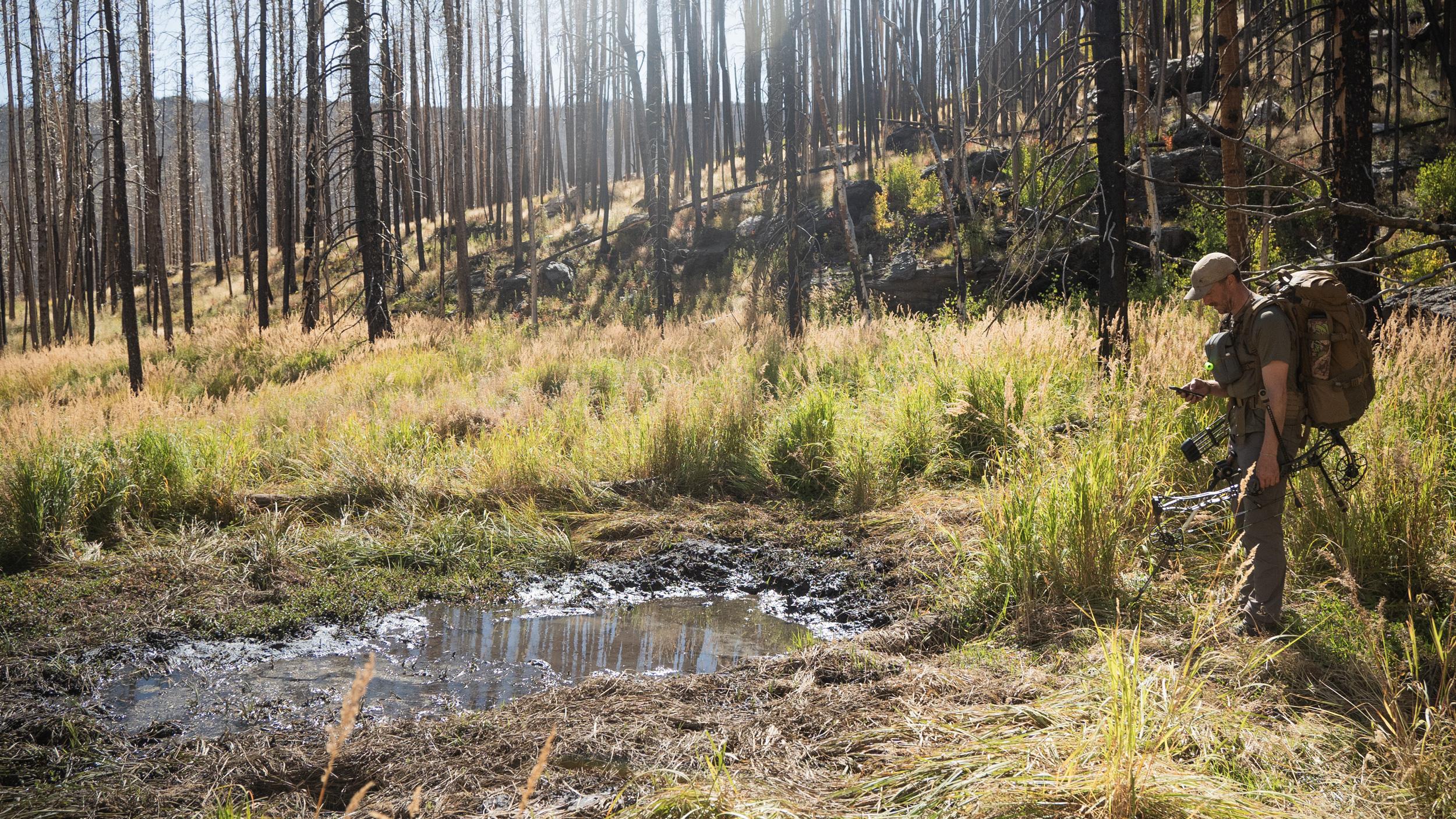 Trail Kreitzer marking an elk wallow on GOHUNT Maps