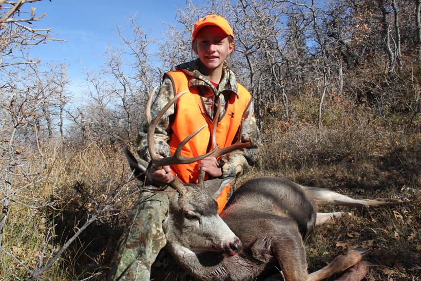 Taylor with her first mule deer