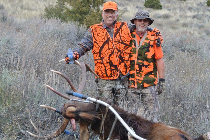 Randy and his brother dan hauling out the elk