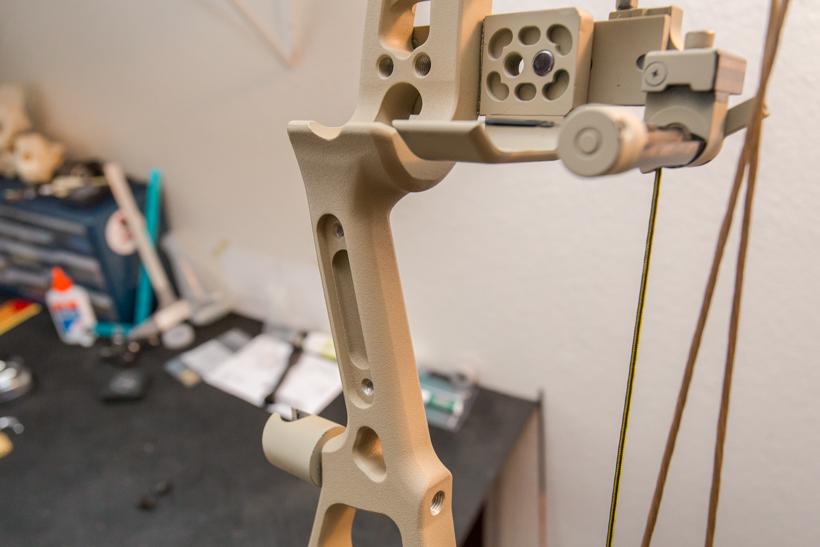 Using the bow riser as a grip