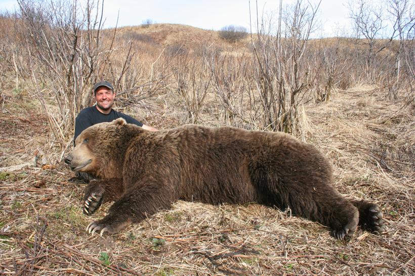 Dave loescher with his brown bear