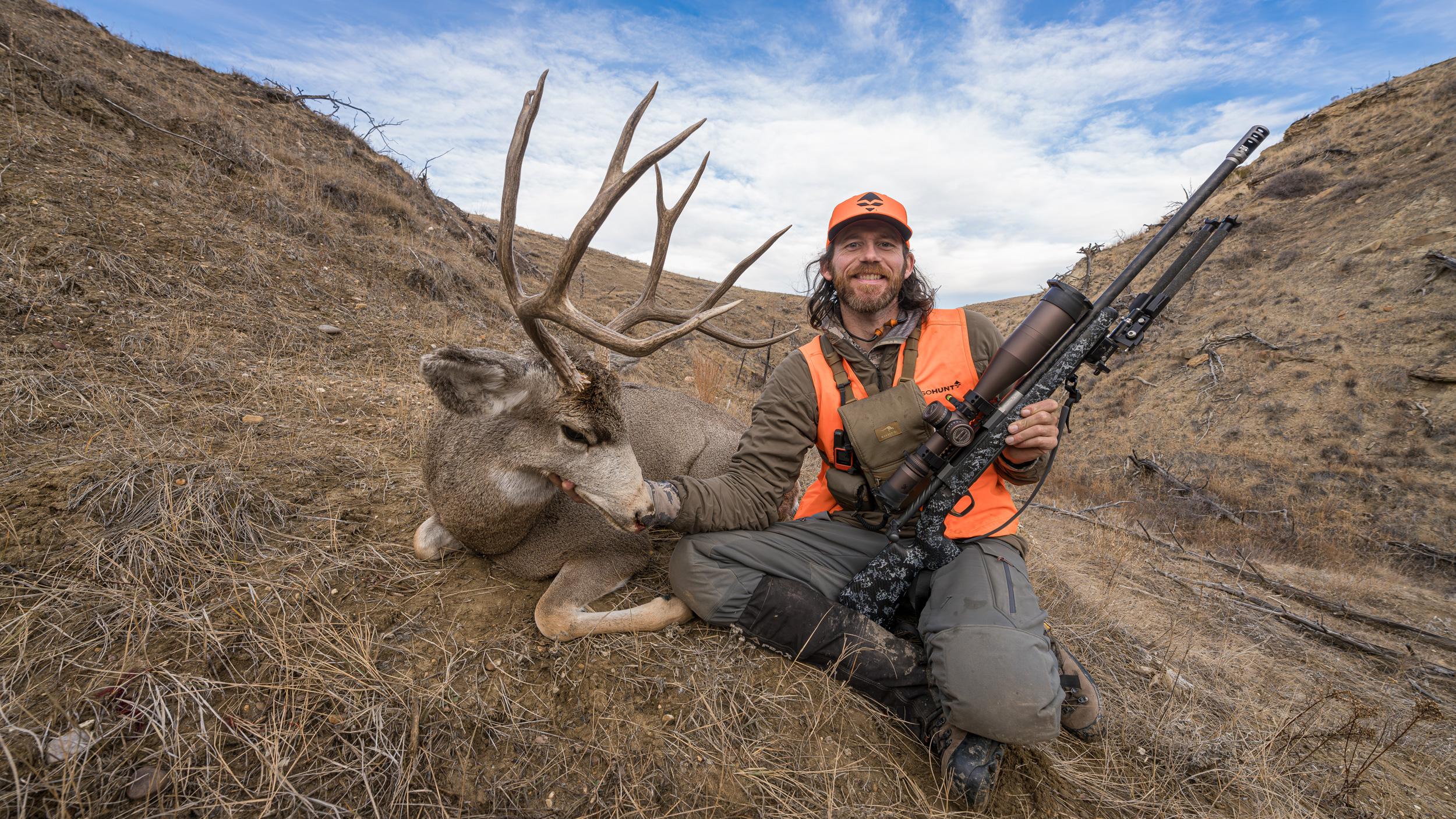 Brady Miller with mule deer taken with 2024 Browning X-Bolt 2 Pro McMillan SPR Carbon Fiber rifle