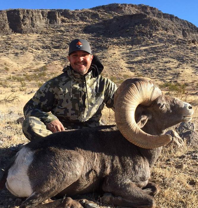 Casey spanish with his nevada desert bighorn sheep taken with 7l outfitters