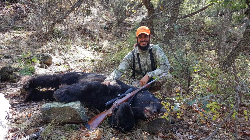 Josh kirchner with his arizona black bear