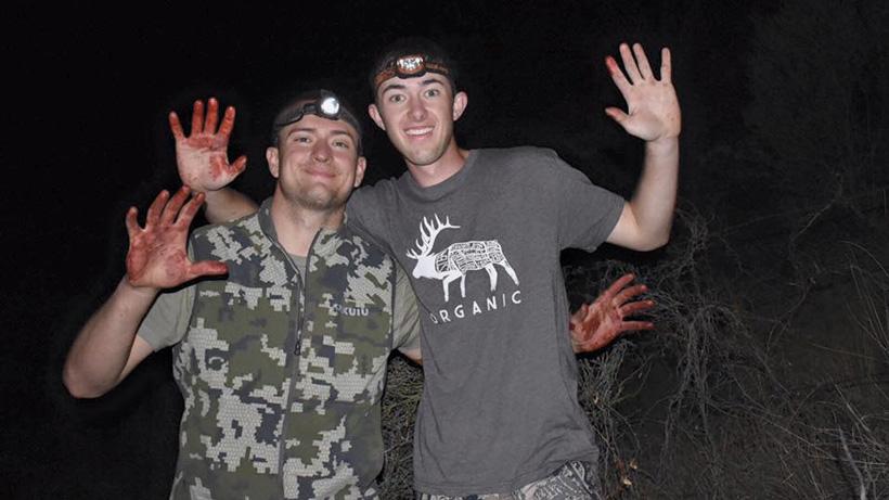 Smiles after cutting up arizona coues deer meat