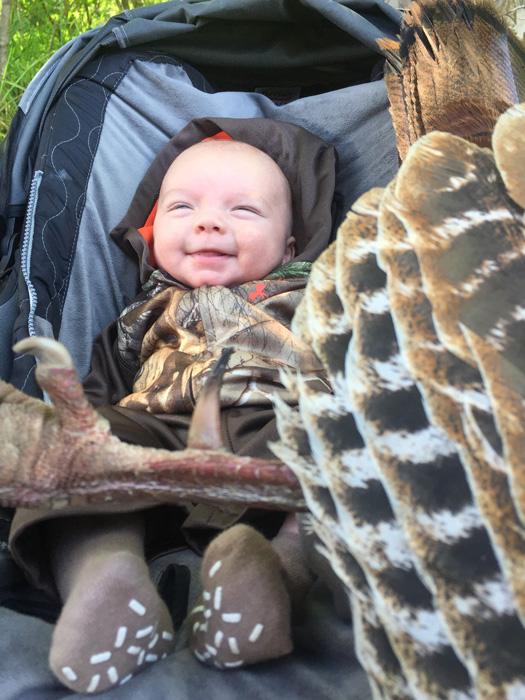 Tiffany and Lee Lakoskys son Cameron with a turkey