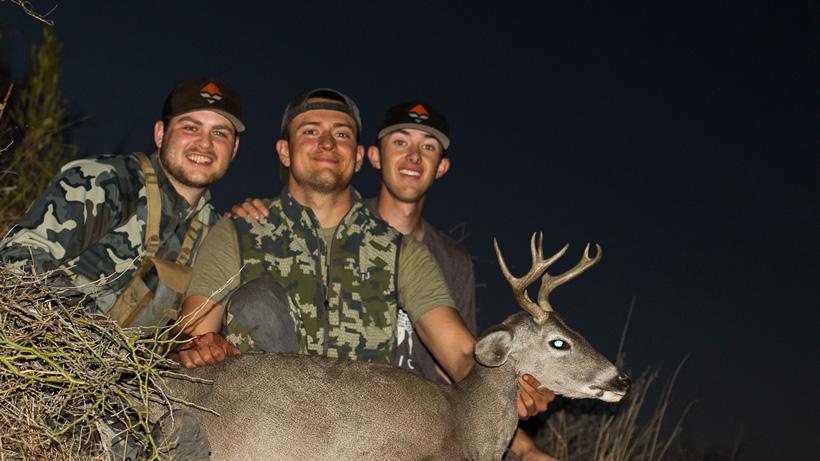 Thomas hamilton and friends with his arizona coues deer