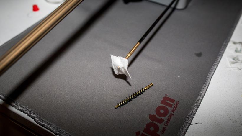 Getting ready to run dry patch through rifle bore