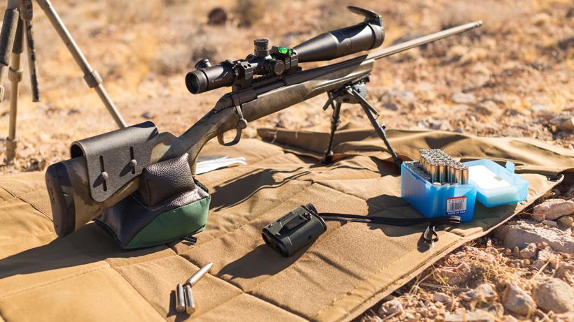 Field shooting testing out cheek height on rifle